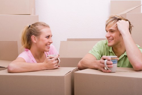 Packed boxes and furniture ready for a local move in Seven Sisters