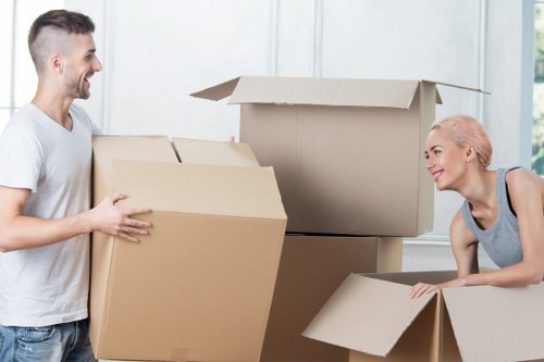 Professional movers loading a van for a Seven Sisters relocation