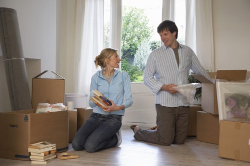 Household boxes and furniture prepared for a move in Seven Sisters