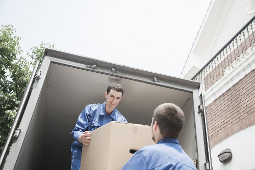 Office relocation team transporting desks and equipment in Seven Sisters