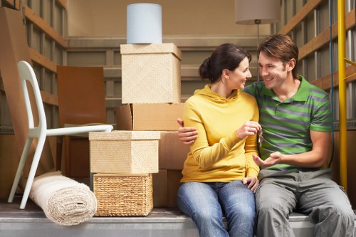 Loading household furniture into a van in Seven Sisters